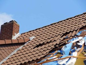 a tile roof undergoing repairs