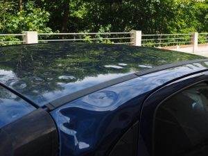 a hail damaged car roof