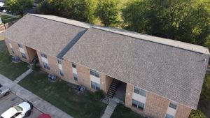 a multi-family building following a roof replacement completed by Dolan Roofing