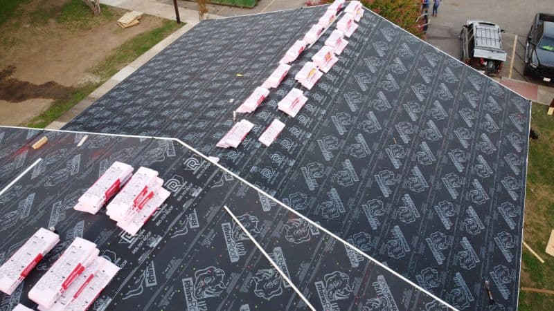 Rhino Roof underlayment during a multi-family roof replacement
