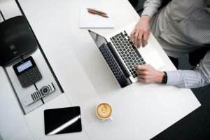 a business owner completes their taxes and takes the Section 179 deduction