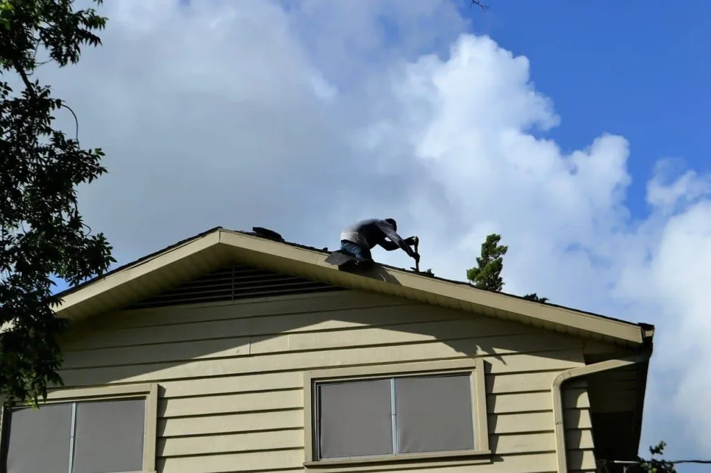 Contractor working on a residential roof