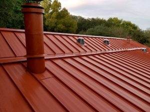 a newly installed standing seam metal roof