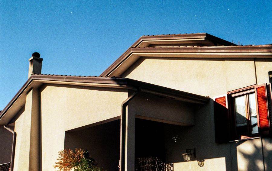 a home with a gutter system that should be checked as part of regular maintenance